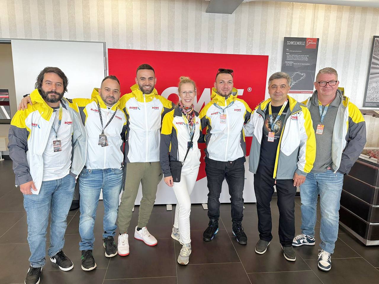 Redline Autohaus owners and team during a ROWE training visit